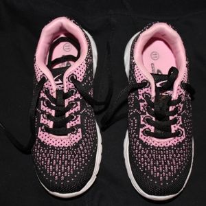 Girls Black & Pink dotted, White soled sneakers.